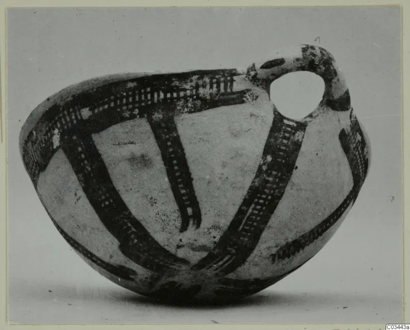 Pottery White Slip Ware vessel from Enkomi with a loop handle and dark painted bands of cross-hatching
