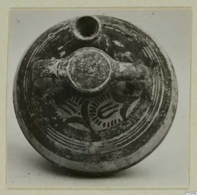 Levanto-Helladic Ware bowl-jar with a short spout, a handle on top and painted concentric bands and motifs