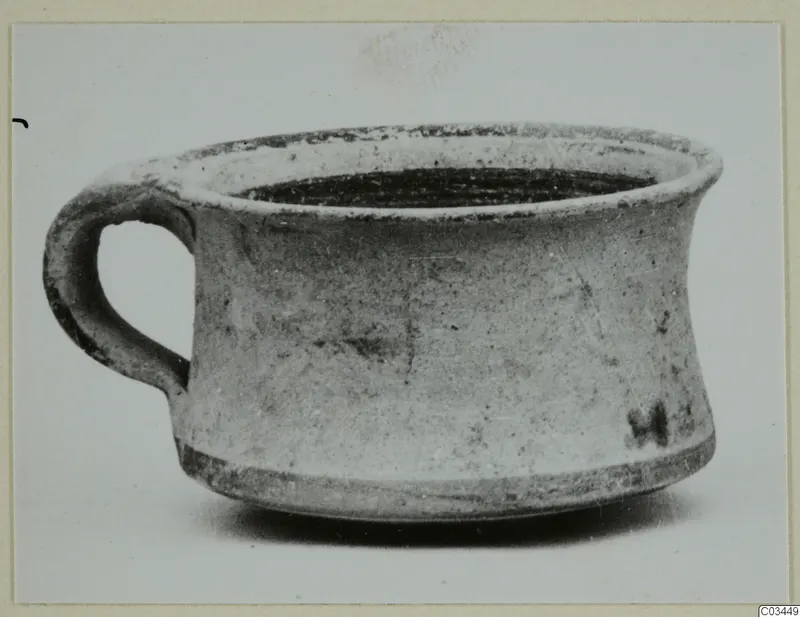 Pottery Levanto-Helladic Ware bowl-jar with a single loop handle, seen from the side against a pale background.