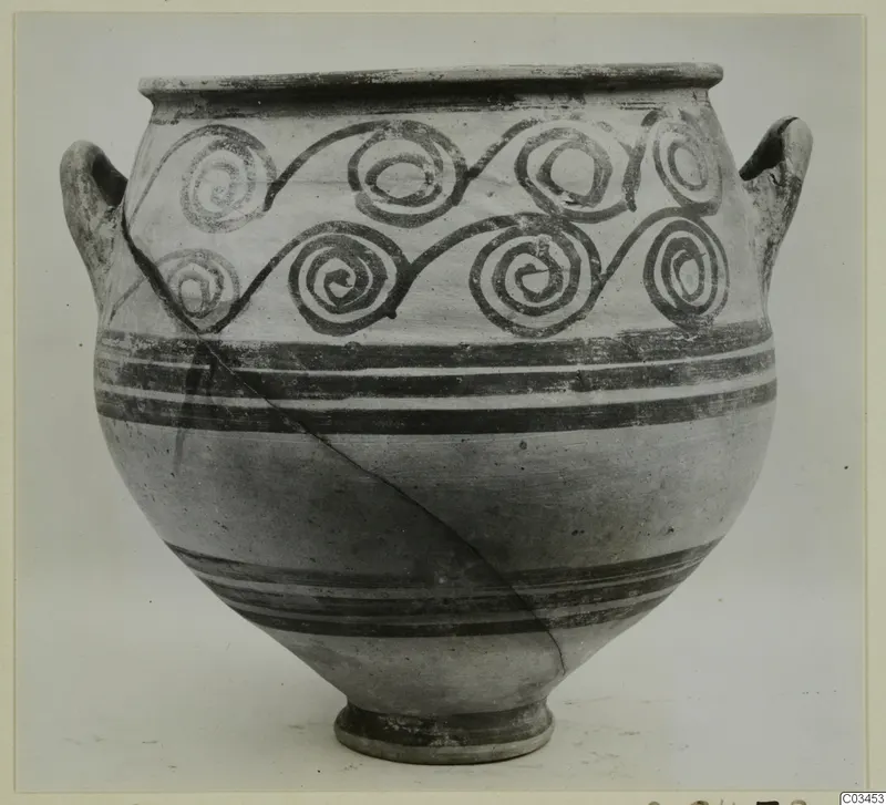 Pottery bowl-jar with two handles and spiral painted decoration around the shoulder.