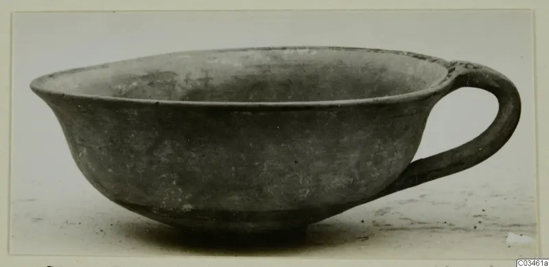Levanto-Helladic Ware bowl-jar with a single loop handle and a pointed lip, dark grey surface
