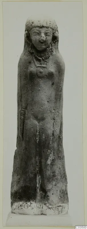 Terracotta figurine of a standing female figure with a necklace, seen from the front.