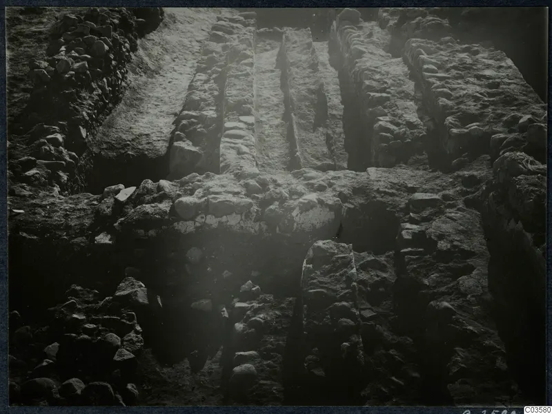 Excavated stone walls and foundations at Soli, Cholades temples, seen from above in a field photograph