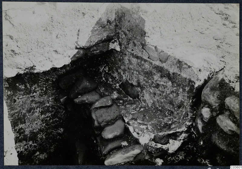 Excavated stone construction at Soli, Cholades Temples C-F, with rounded stones set in a line