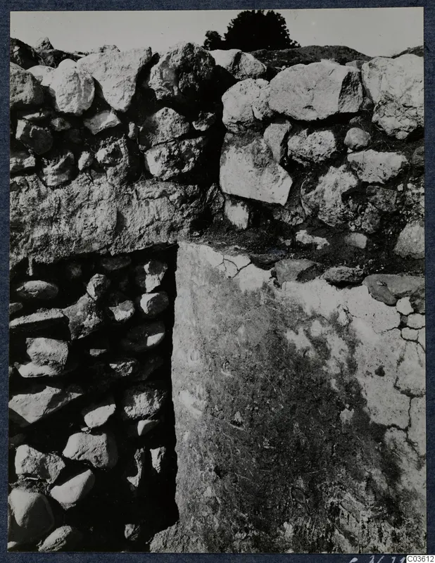 Stone wall construction at Soli, Cholades Temples, with rubble masonry on the left and a smooth pale face on the right