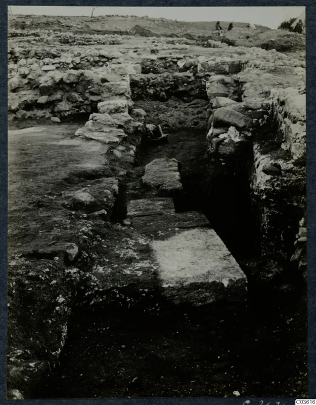 Excavation at Soli, Cholades Temples, showing stone walls and a stone-lined trench