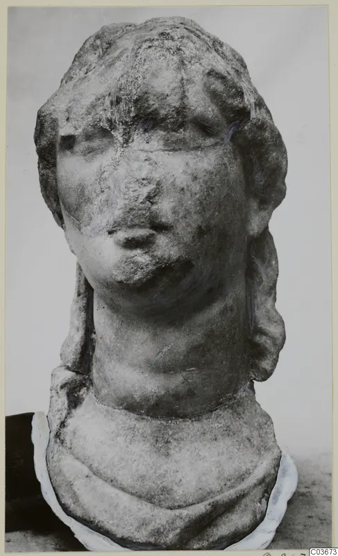 Marble sculpture of a head and bust from Soli, shown from the front