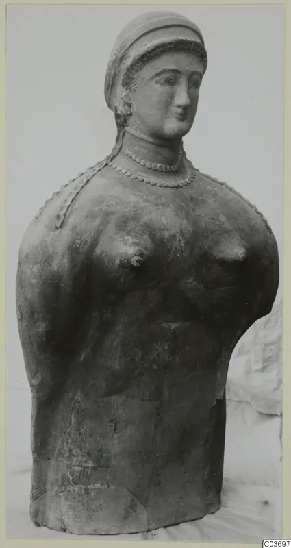 Bust of a woman with a cylindrical headdress and beaded necklace, from Vouni