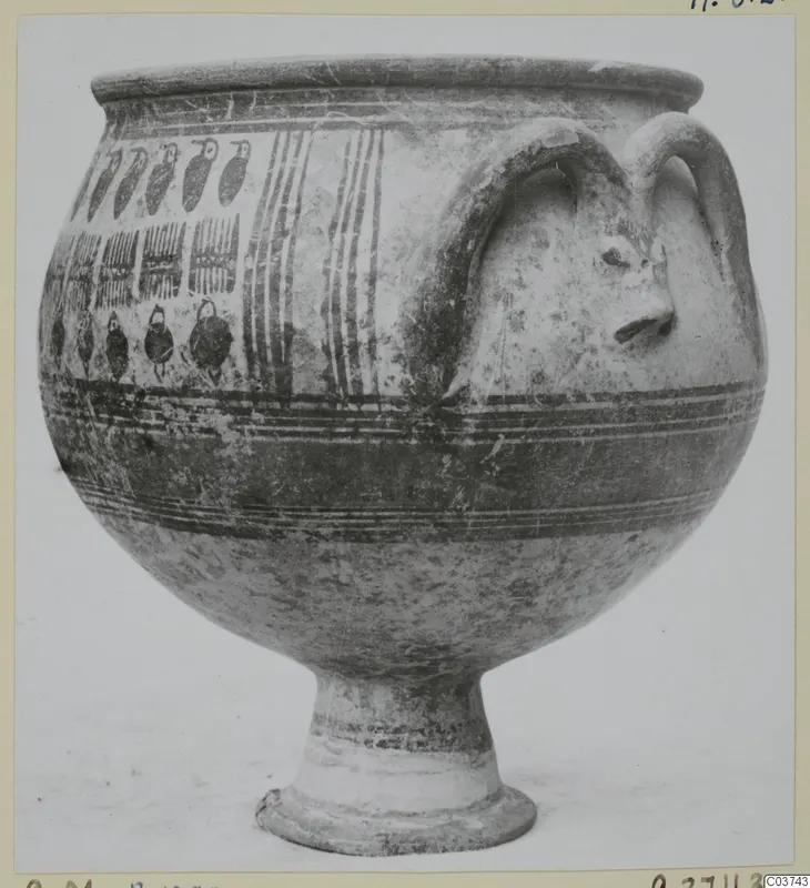 Painted pottery vessel on a high foot, with two looped handles, one with a modelled face, and bands of birds and stripes.