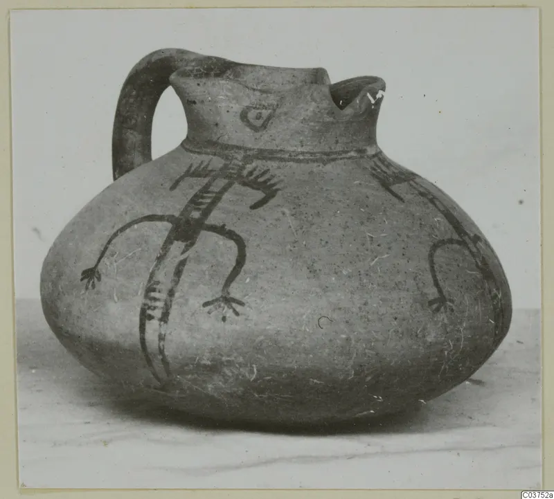 White Painted IV jug with a looped handle and dark painted figures with limbs on its rounded body