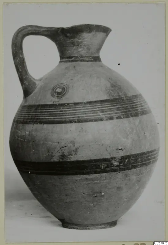 Jug with a single loop handle and dark painted bands, Pottery Black-on-Red II-IV