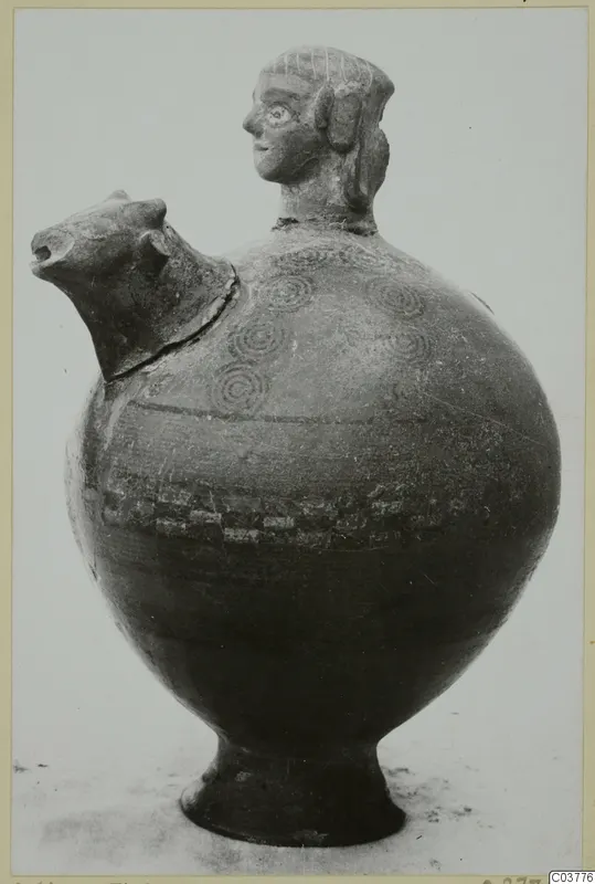 Pottery vessel with a modelled human head on the neck and an animal head forming the spout