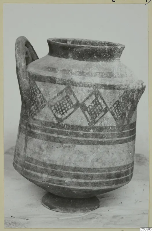 White Painted I amphora with dark painted bands and diamond panels filled with cross-hatching