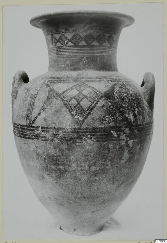 Two-handled painted pottery vessel with bands and diamond patterns, shown alone against a plain grey backdrop.