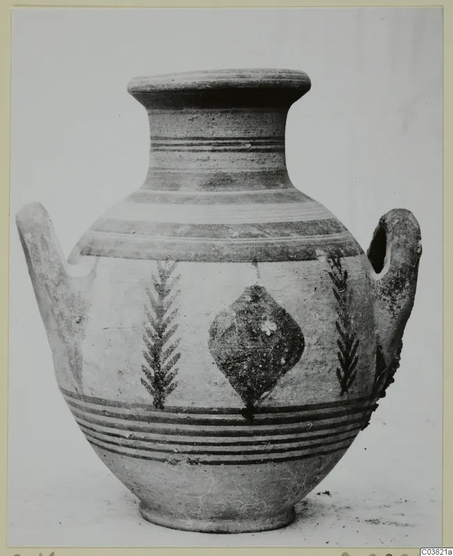 Painted pottery vessel with two handles, photographed from the side against a plain background