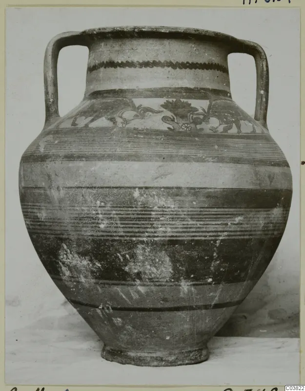 Two-handled painted pottery vessel with horizontal bands and a painted motif band on the shoulder, photographed on a card mount.