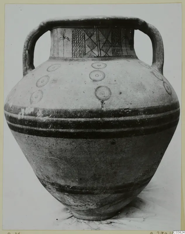 Two-handled jar with painted neck panels and concentric circles on the shoulder