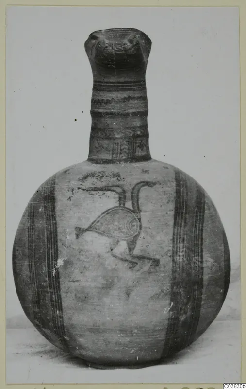Globular jug with a tall neck, painted with horizontal bands and a long-necked bird on the body