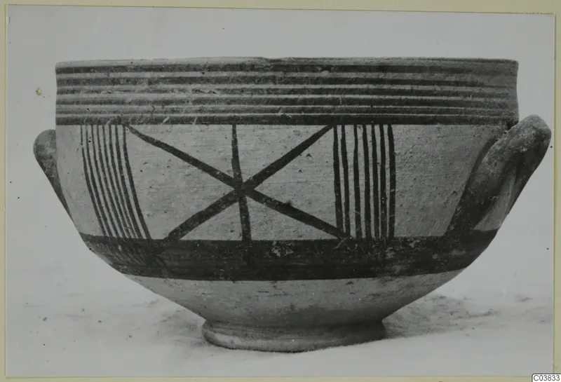 Pottery White Painted III-1: a two-handled bowl with horizontal rim bands, vertical stripes and a crossed-diagonal motif painted on its body
