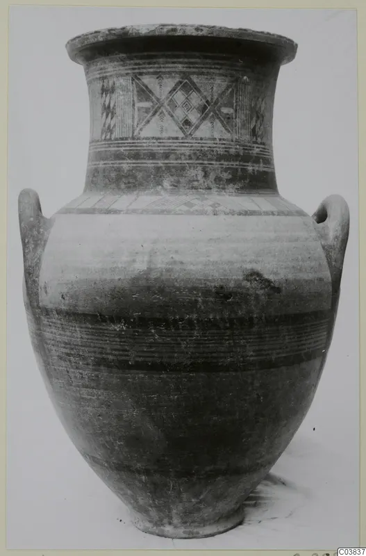 Large two-handled painted pottery jar with diamond and lozenge patterns on the neck and shoulder.