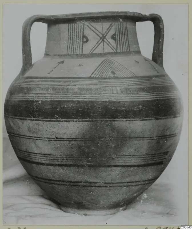 Two-handled painted pottery jar with horizontal bands and hatched motifs on its shoulder and neck