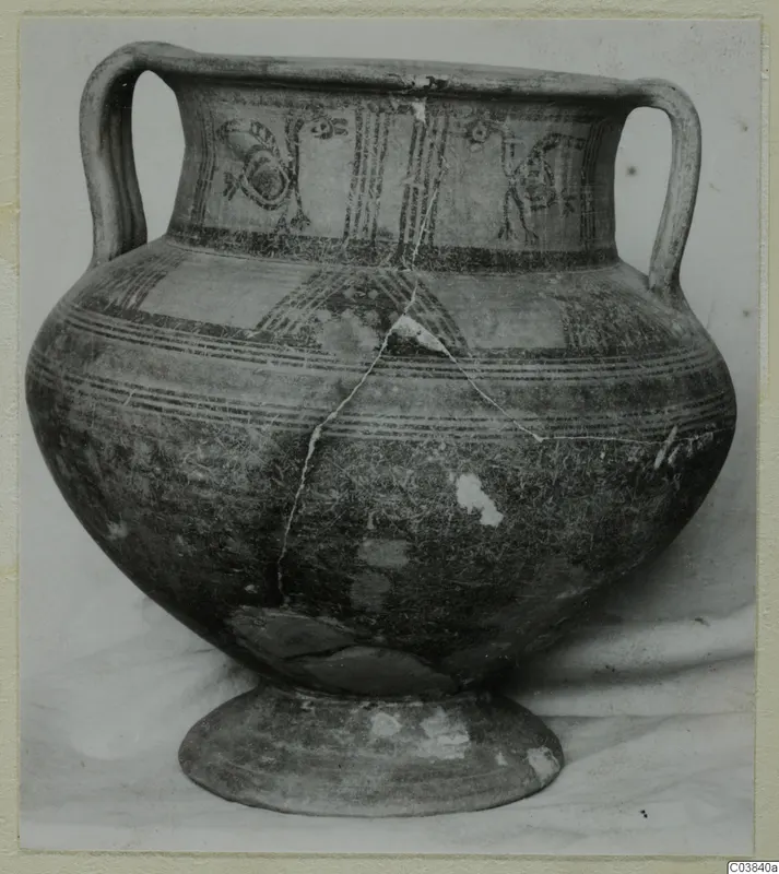 Two-handled painted pottery vessel on a ring foot, with bird-like motifs and stripes on the neck panel and bands on the body.