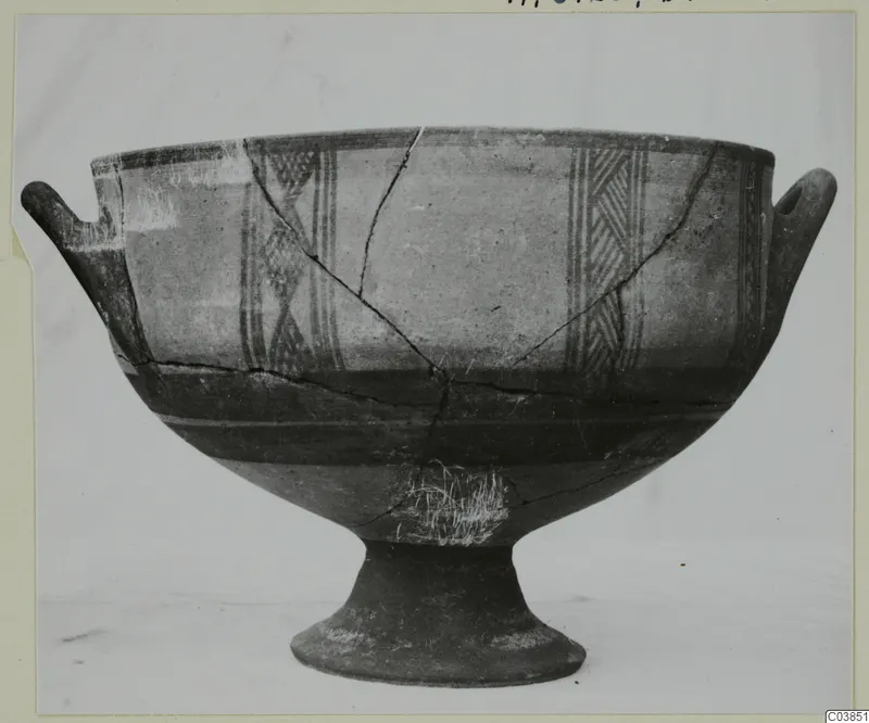 Pedestal bowl with two horizontal handles and painted panels of hatched decoration, seen from the side
