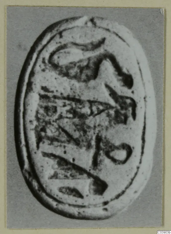 Oval object with an incised design, photographed close up, from Amathus
