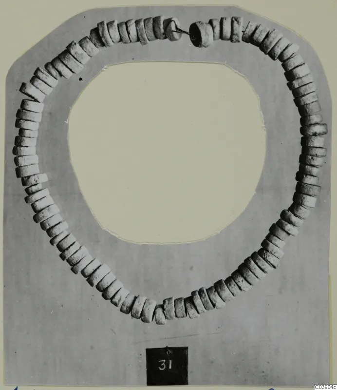 Necklace of many disc-shaped stone beads with a thin wire clasp, from Amathus