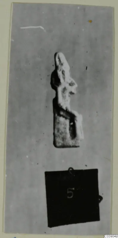 Small figurine of Sekhmet from Amathus tombs, shown against a grey ground with a black number label below