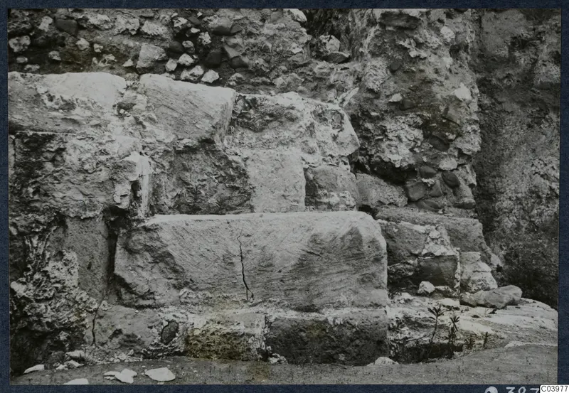 Stepped large stone blocks and rubble masonry exposed in excavation at the theatre at Soli