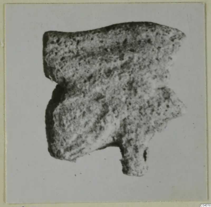 Irregular fragment with a projecting stub, a find from Ayia Irini