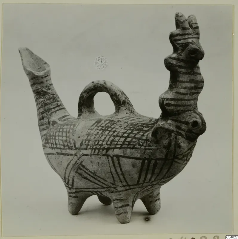 Painted clay bird-shaped vessel with a long spout, a handle and three legs, decorated with dark bands and cross-hatching.