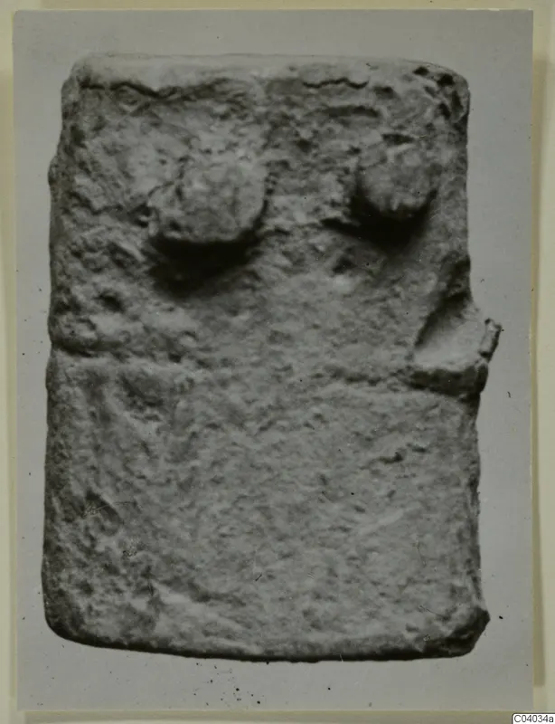 Lead plaque, rectangular, with two rounded knobs near the top edge.
