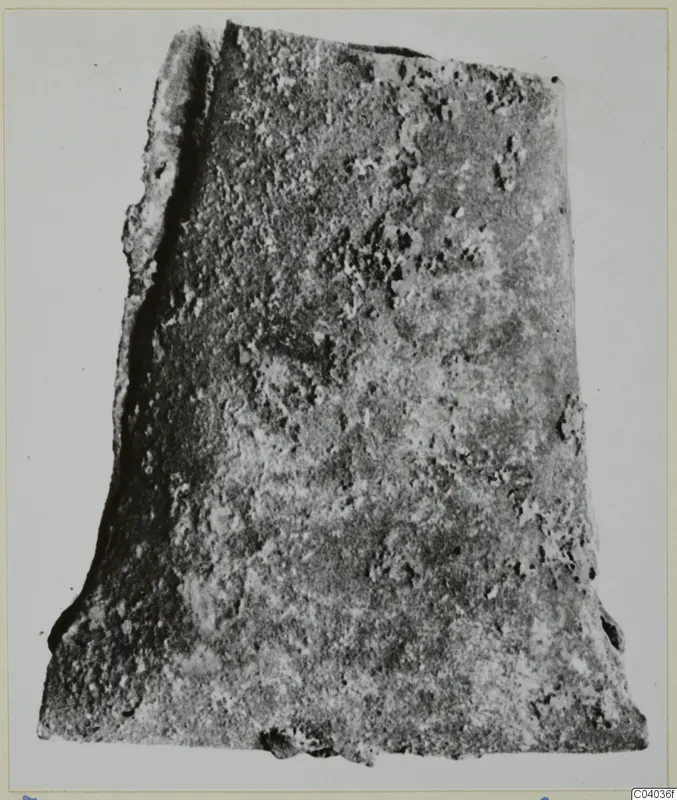 Bronze mounting fragment from Idalion, corroded and encrusted