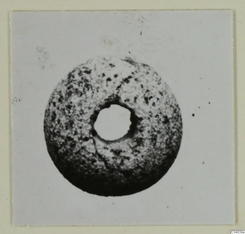 Round disc-shaped find with a central hole, from the Idalion small finds series