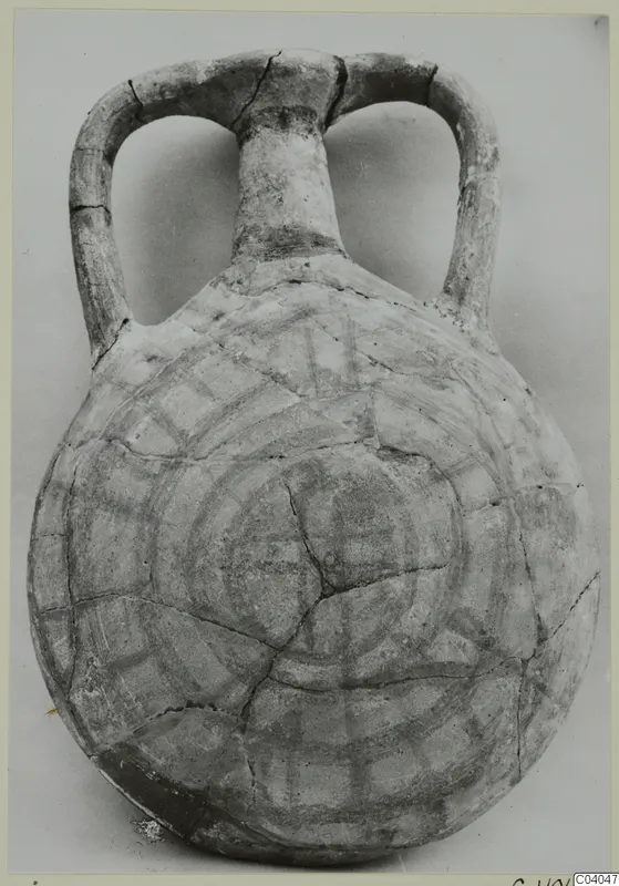 Pottery White Painted IV-V flask with two loop handles, a short neck and dark concentric circle and band painting