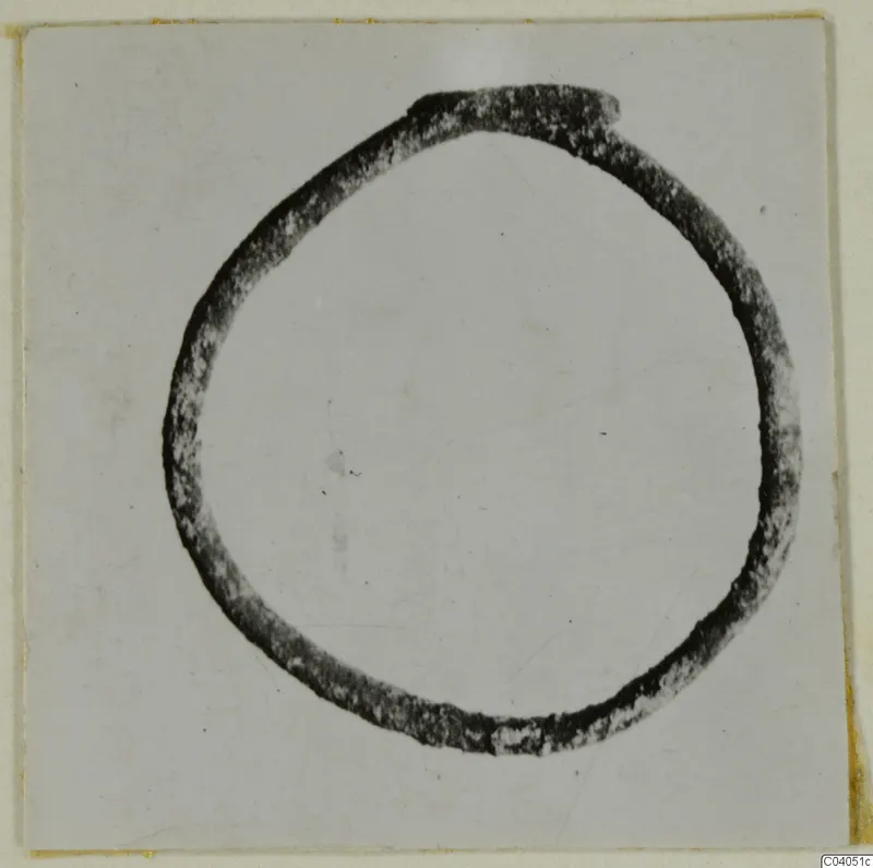 Bronze ring-shaped personal adornment from Idalion, shown alone on a pale background