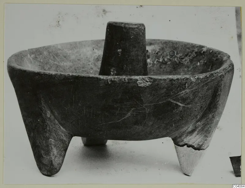 Three-legged stone bowl with a pestle standing upright in it, Enkomi small finds