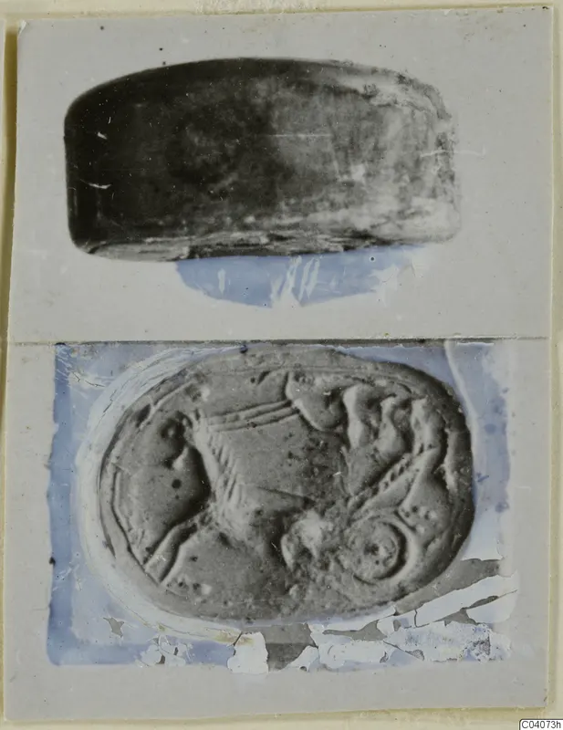 Two photographs of a stone seal: a side view above and its oval face with a raised animal design below
