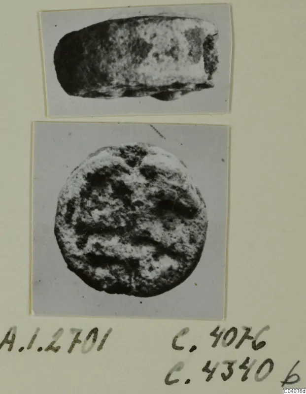 Two small stone objects from Ayia Irini, one seen from the side and one from above.
