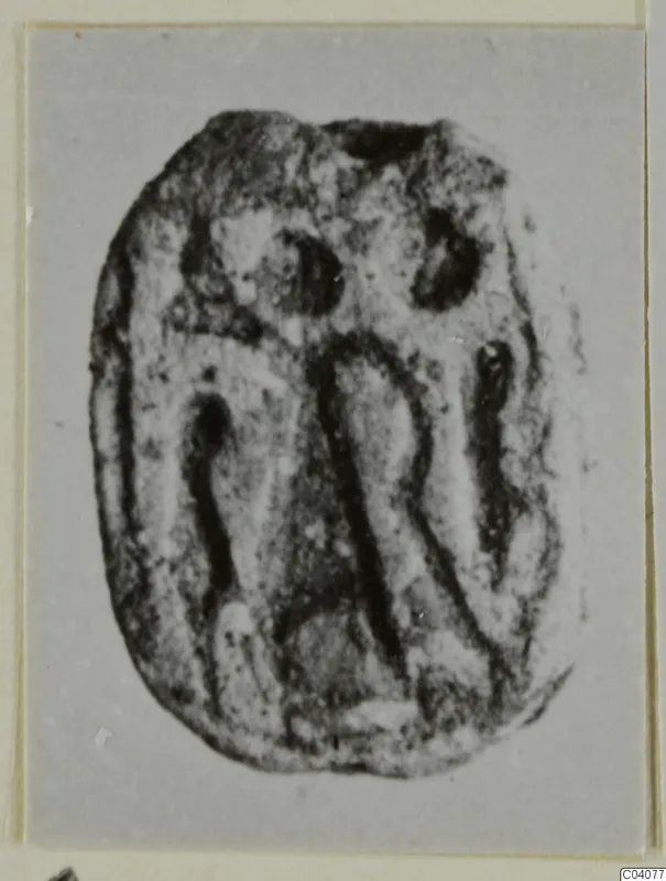 Engraved seal or gem from Ayia Irini, photographed on a grey card