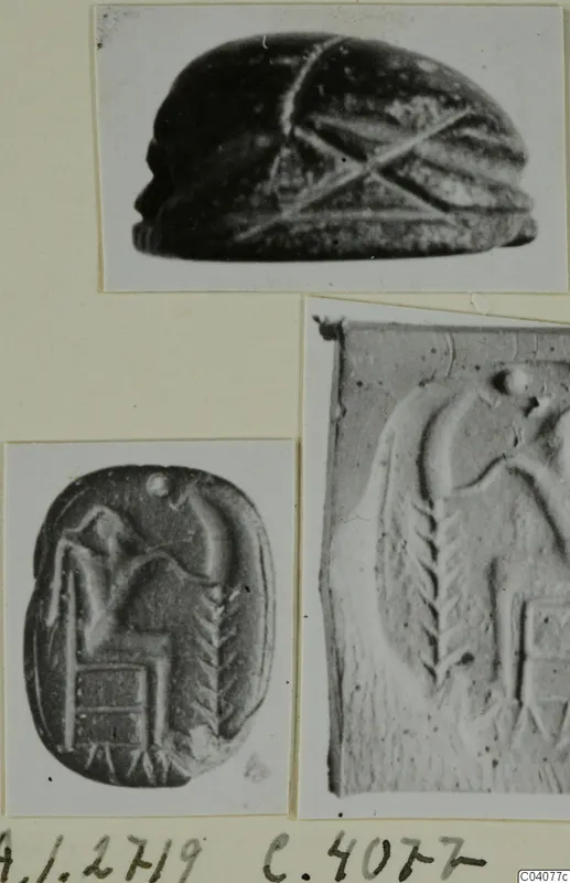 Photo mount with three views of a dark stone scarab seal: domed back and engraved seal faces with seated figures.