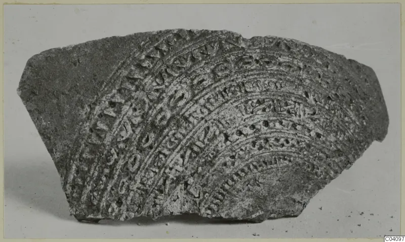 Faience fragment from Vouni with a pattern of curved raised bands and small motifs