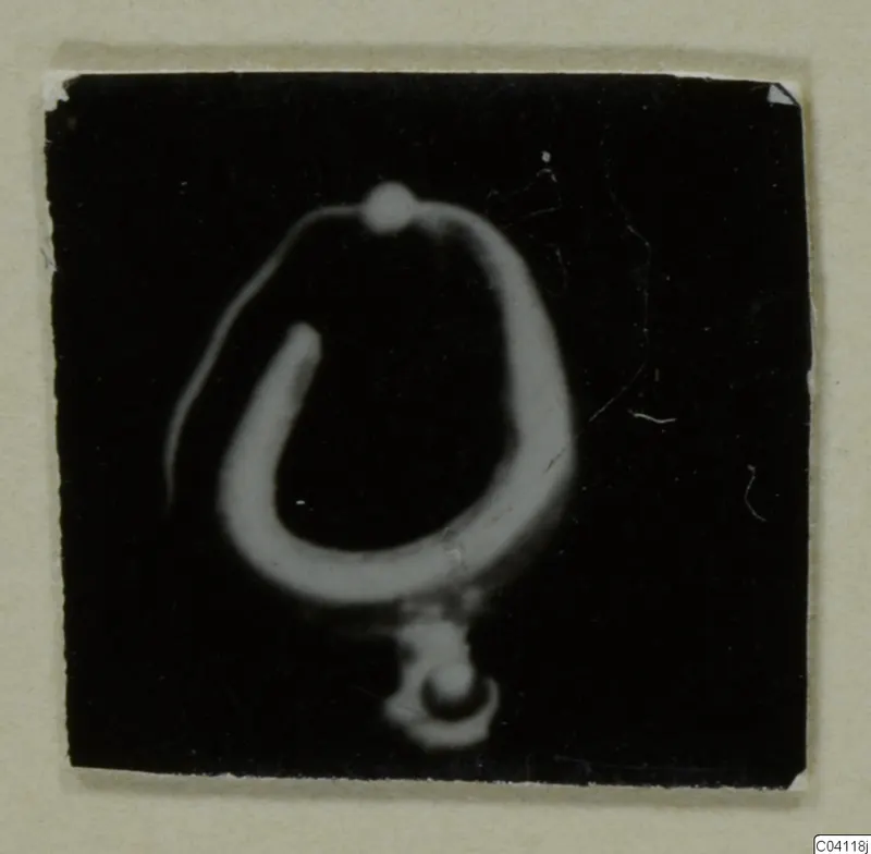 Gold hoop earring with a small pendant, from Amathus, shown as a negative image