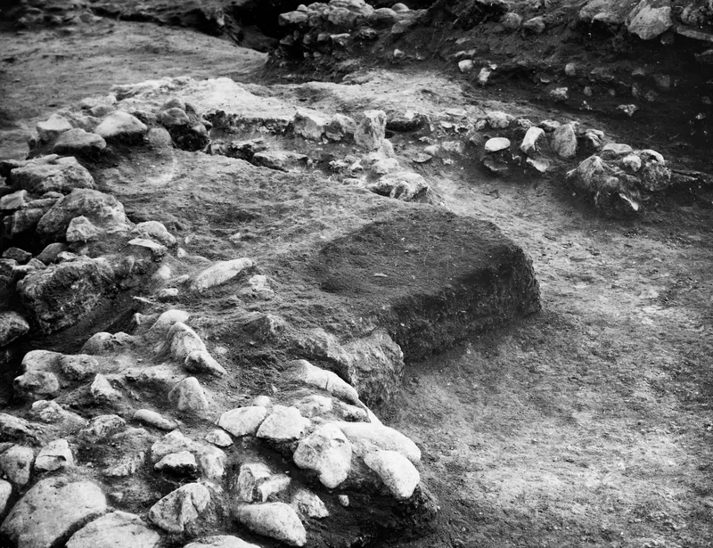 Excavated room at Cholades with a rectangular offering pit beside low stone walls