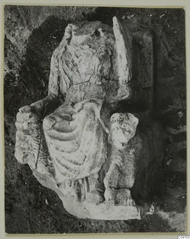 Stone sculpture of a draped figure from Soli, broken and lying in excavated soil