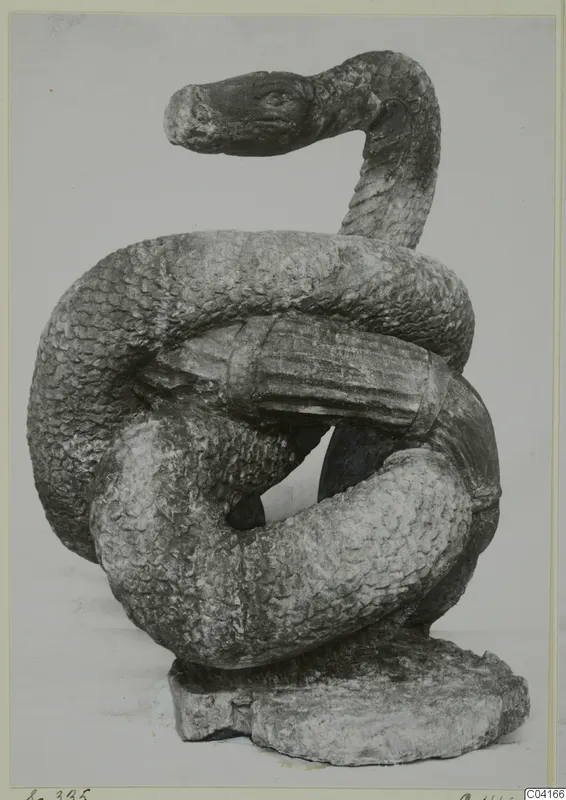Stone sculpture of a coiled snake with raised head, from Soli
