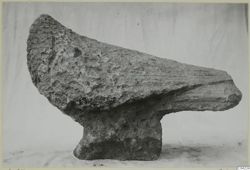 Weathered limestone minor plastic from Soli, with a tapering upper form on a thick pedestal-like base