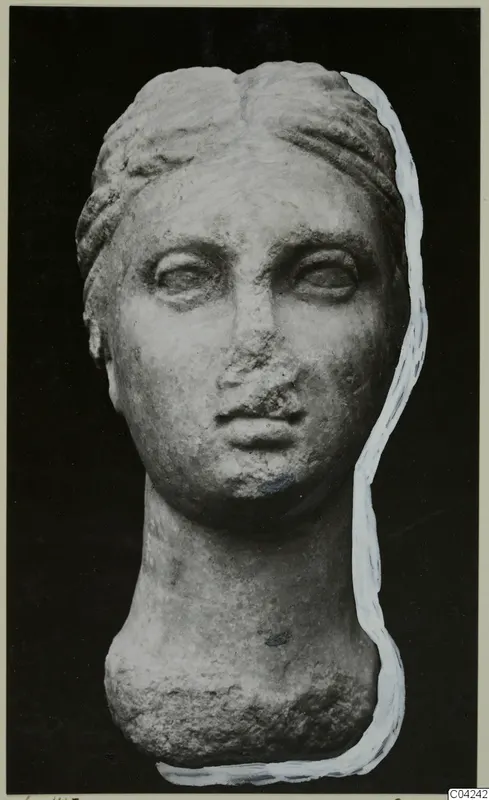 Marble head with hair drawn back in bands, from the Soli finds